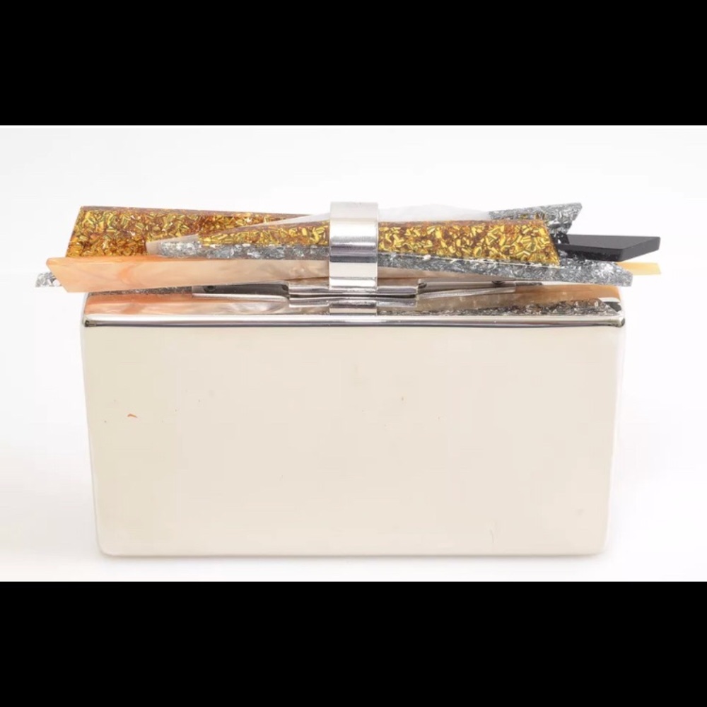 Edie Parker Wolf Shard Lock silver metal clutch